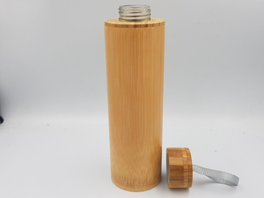 Glass vase wrapped in bamboo