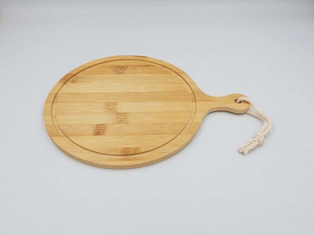 Round bamboo cutting board with handle D25H1 cm